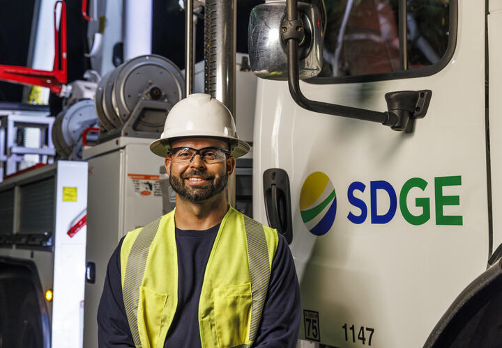 SDGE worker next to truck