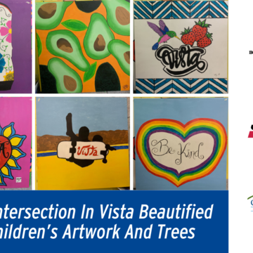 Busy Intersection In Vista Beautified With Children’s Artwork And Trees 