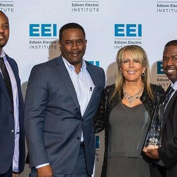Bruce Mayberry and Sydney Furbush accepting Diversity Award on behal of SDG&E