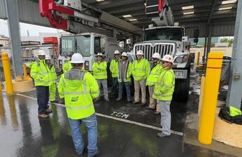 SDG&E field employees gather for a tailgate meeting. 